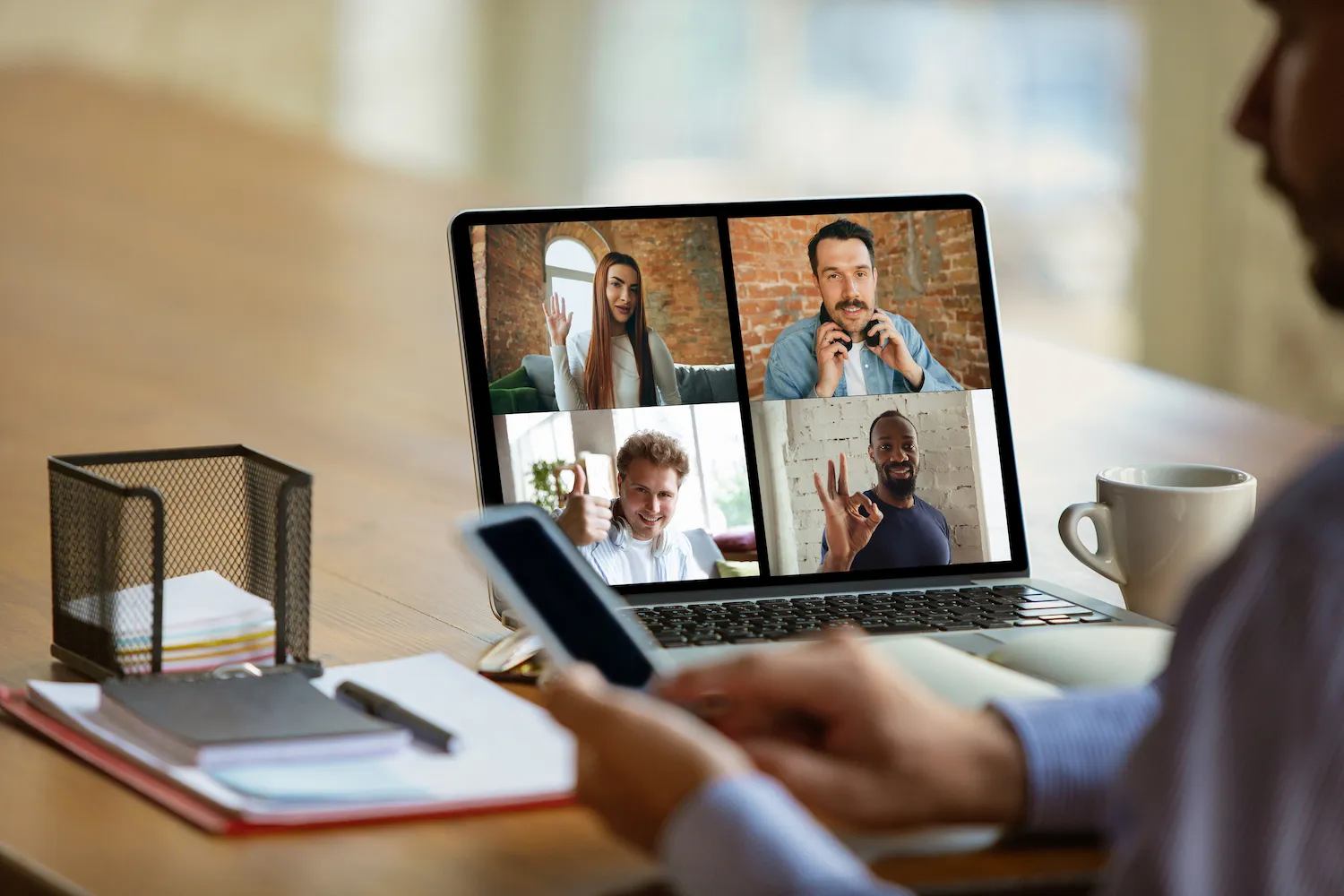 4 people in office on zoom